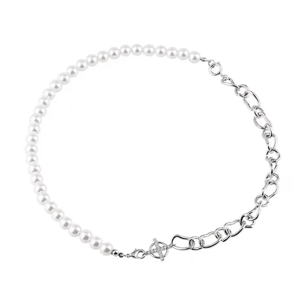 White asymmetric geometric acrylic pendant on a twisted chain necklace.