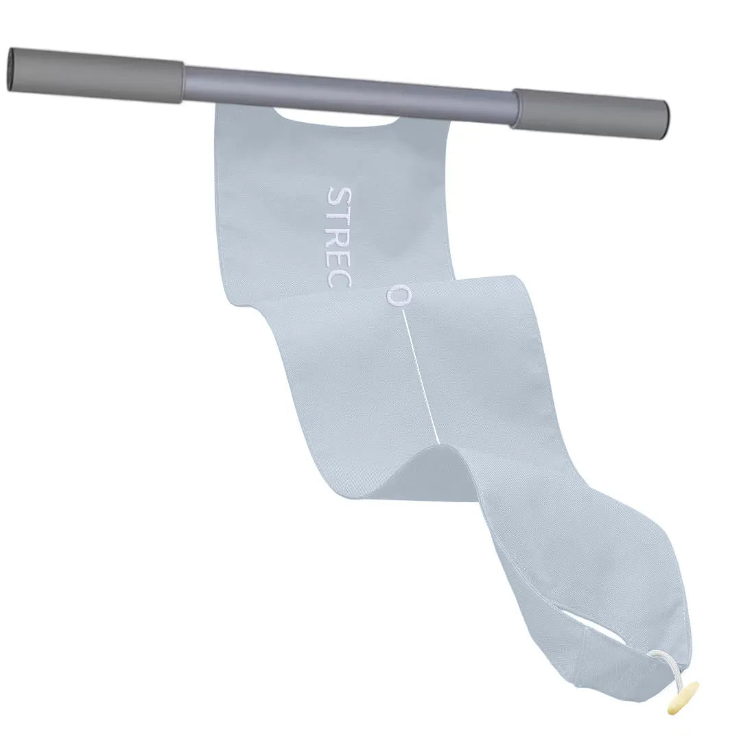 Grey and pink yoga stretching tool for shoulders, back, and hips on a fitness mat.