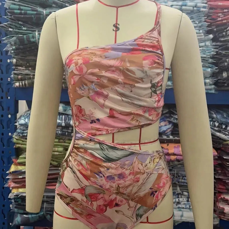 Women's rose gold pattern swimsuit made from polyester fabric available in multiple sizes