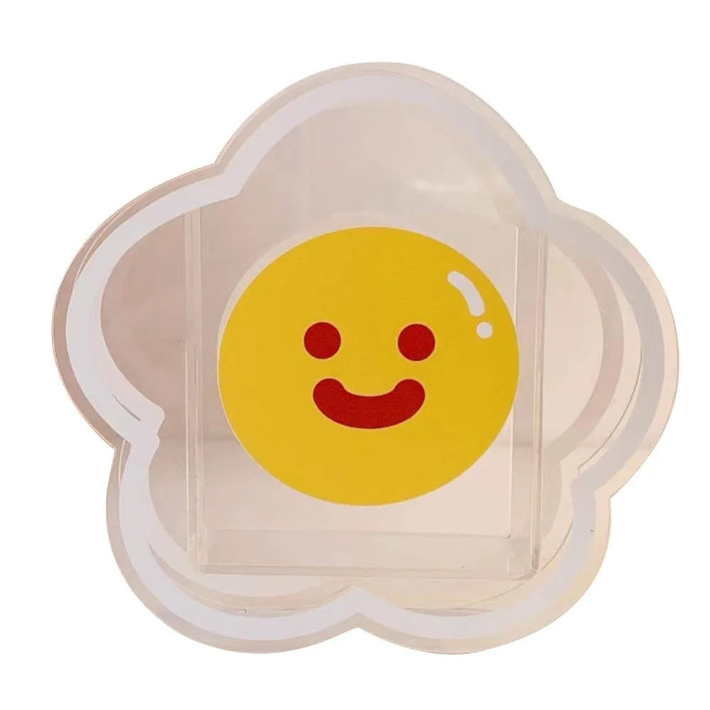 Clear square acrylic storage box with a cute strawberry rabbit character design on a desk.