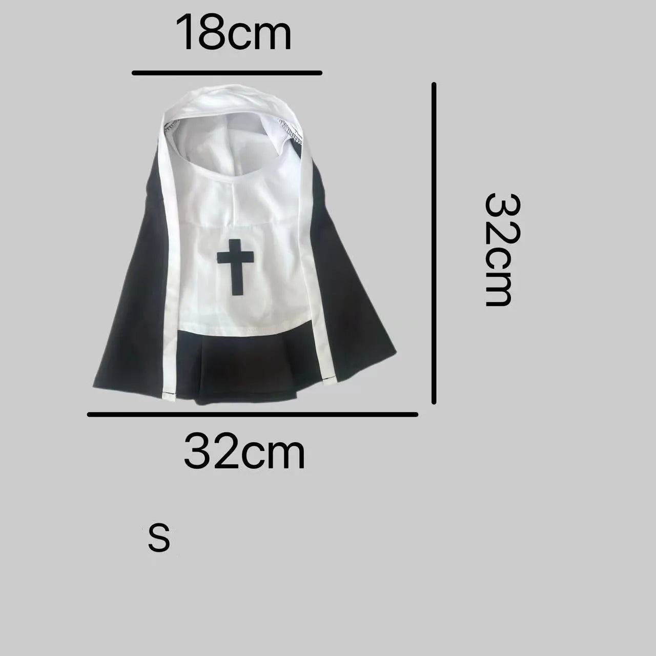 Black and white nun costume cloak outfit on a small or medium dog for Halloween.