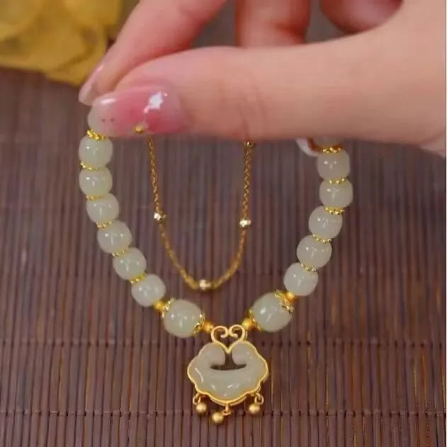 Women's green safety lock bell pendant bracelet with double-layer design and electroplated finish
