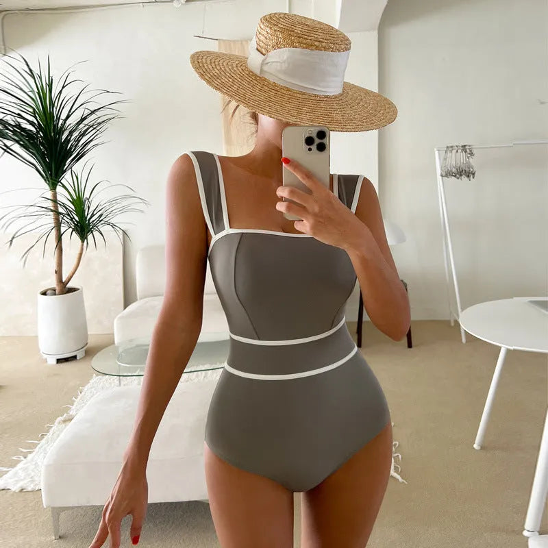 Women's backless lace-up one-piece swimsuit in nylon available in white, black or grey colours