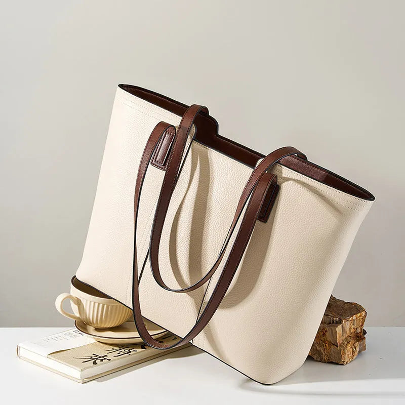Women's black genuine leather crossbody bag with horizontal square shape and single shoulder strap
