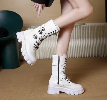 Women's black mid-calf knight boots with large metal buckle and side zip on a white background.