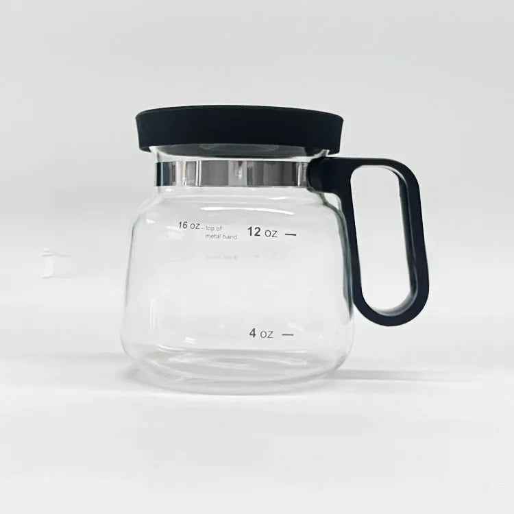Transparent borosilicate glass stovetop coffee maker with grey silicone cover