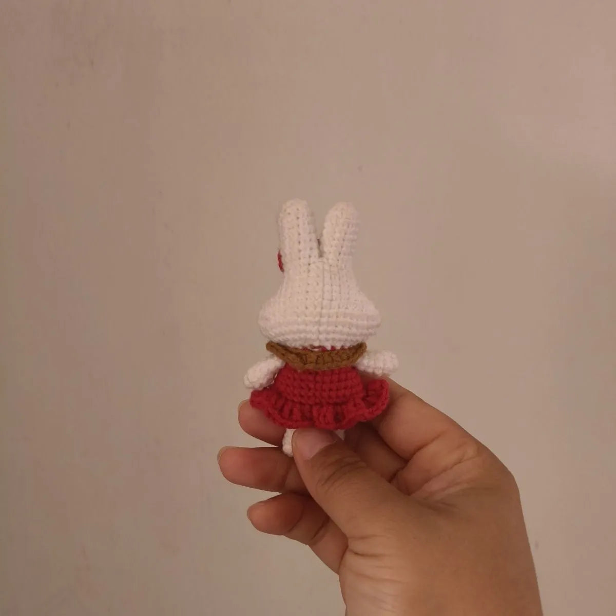 Hand-crocheted wool rabbit pendant accessory with key chain attachment option