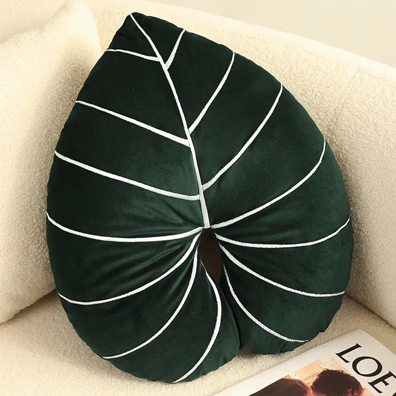 Large embroidered botanical cushion with Monstera deliciosa pattern on plush fabric