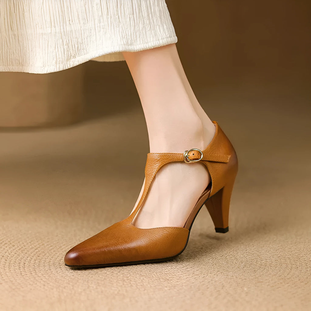 Brown women's retro sandals with a buckle T-strap, closed round toe, and a chunky short heel.