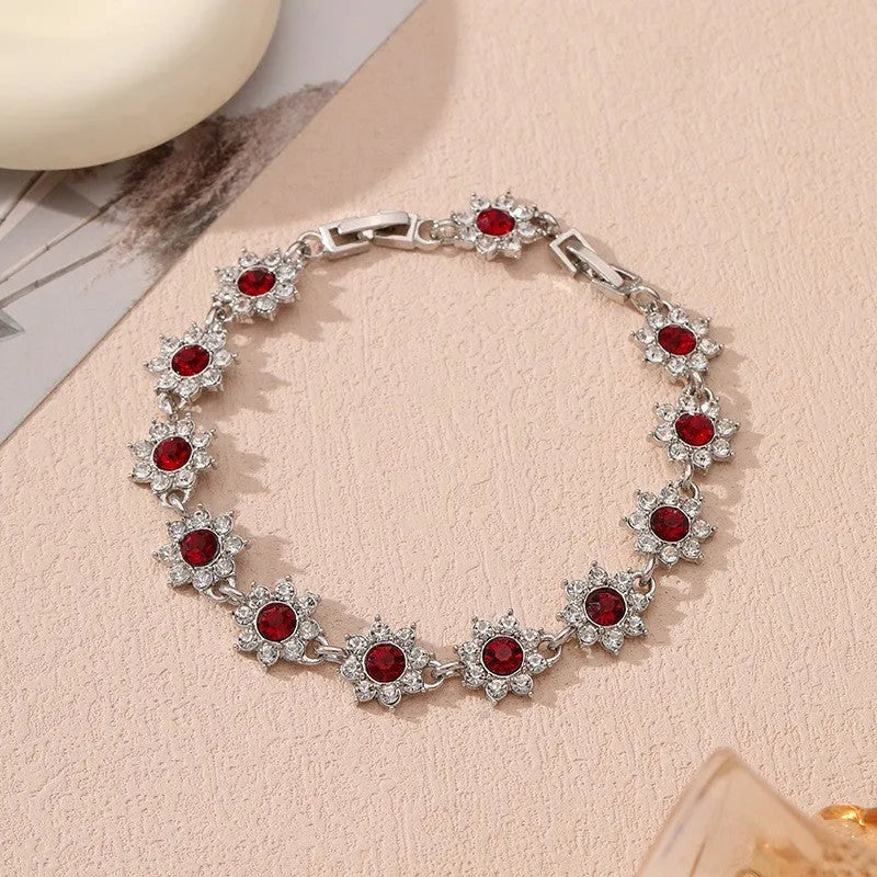 Flower-shaped zinc alloy bracelet with electroplated finish and colourful crystal accents
