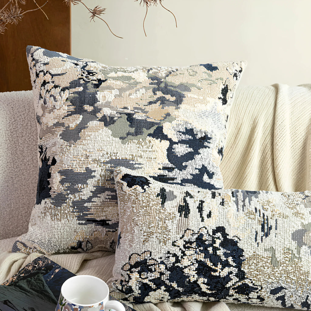 Chinese style antique blue floral pattern decorative cushion with wool blend cover on a sofa.
