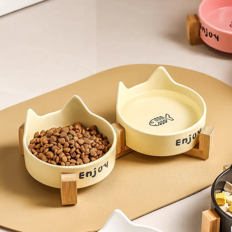 Porcelain cat bowls with wooden frame in cat ear paw design