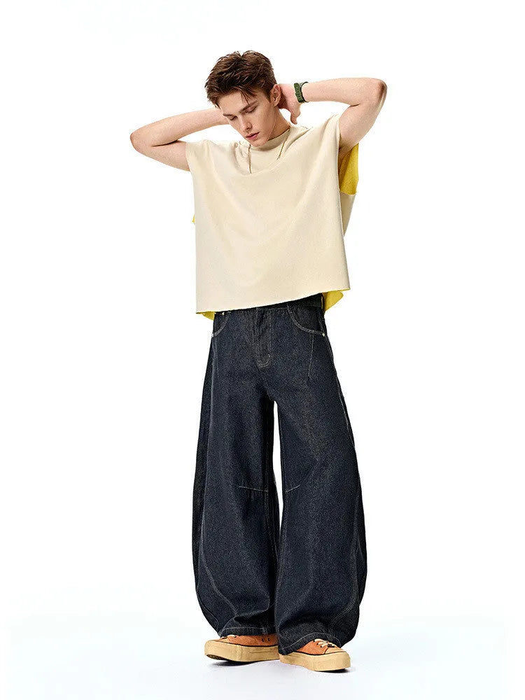Men's wide leg denim trousers in original cow colour wash with mid waist rise