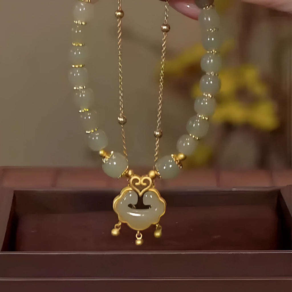 Women's green safety lock bell pendant bracelet with double-layer design and electroplated finish