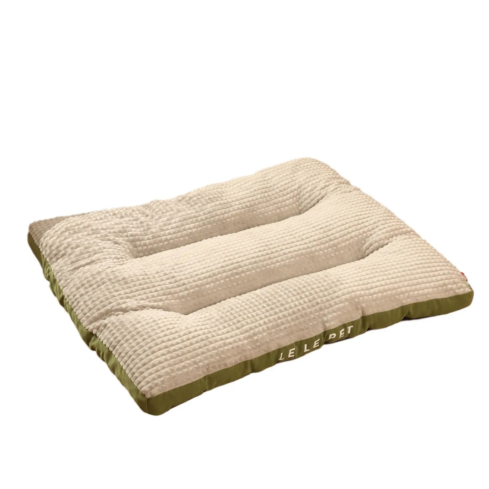 Detachable soft fleece dog bed in green, shown with blanket separated from the cushion base.