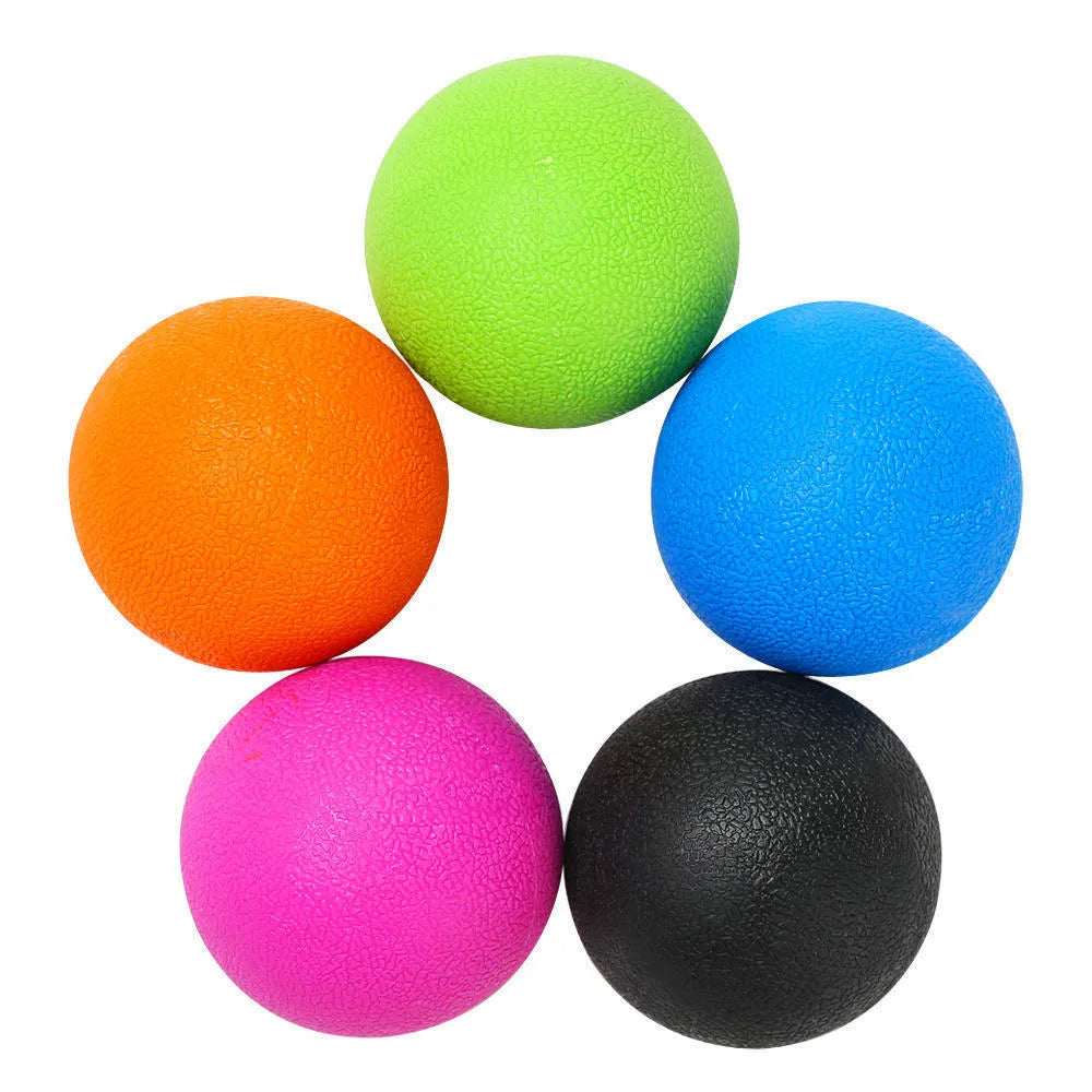Green TPE yoga massage ball with 6.1 cm diameter on a plain background.