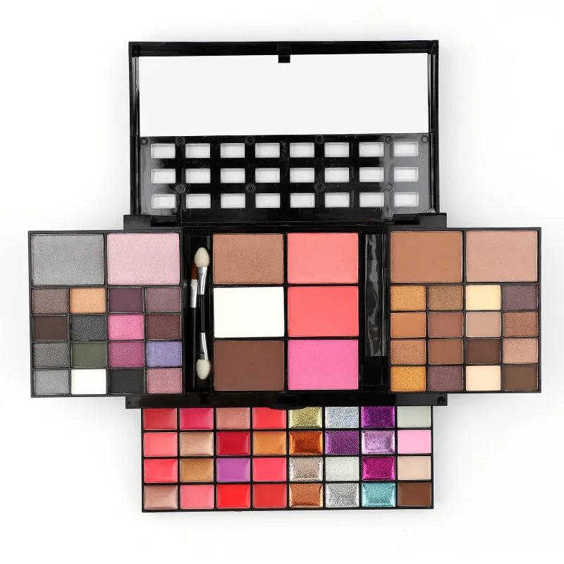 Four-layer 74 colour makeup palette with eyeshadow, lip gloss, and brushes in a plastic case.