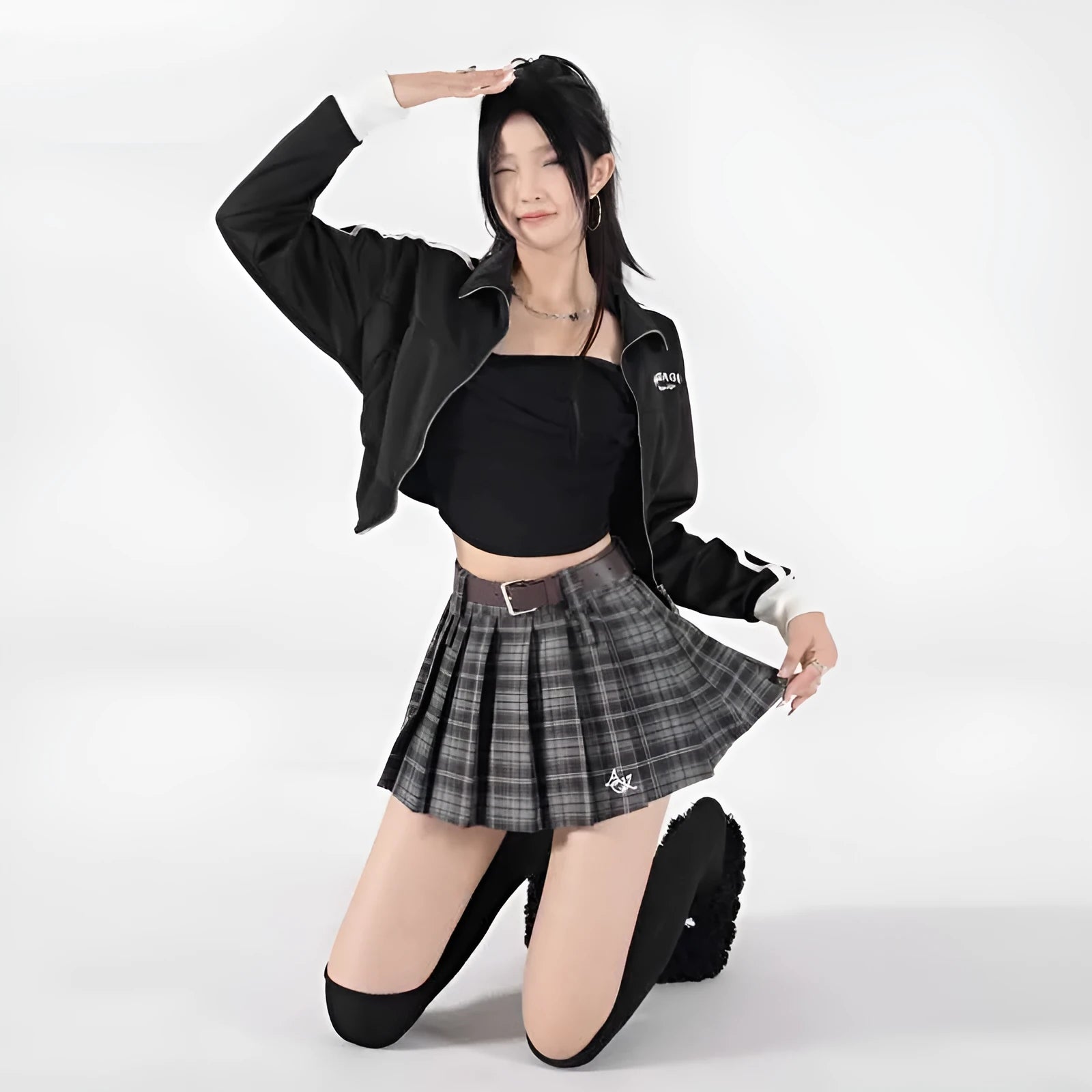 High-waist American retro A-line pleated skirt in black plaid pure cotton spandex blend, front view