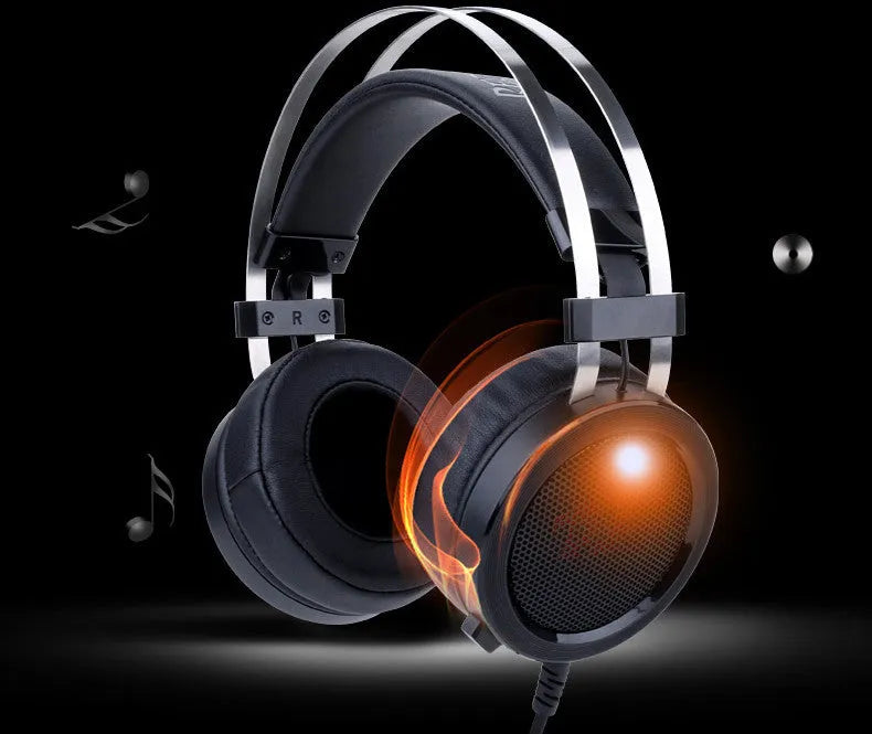 Black wired over-ear computer gaming headset with a 3.5mm jack and long cable.