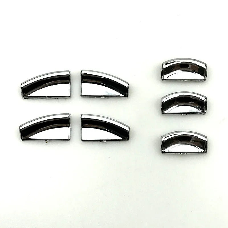 Black glitter decorative sticker for car window lift button panel on door.
