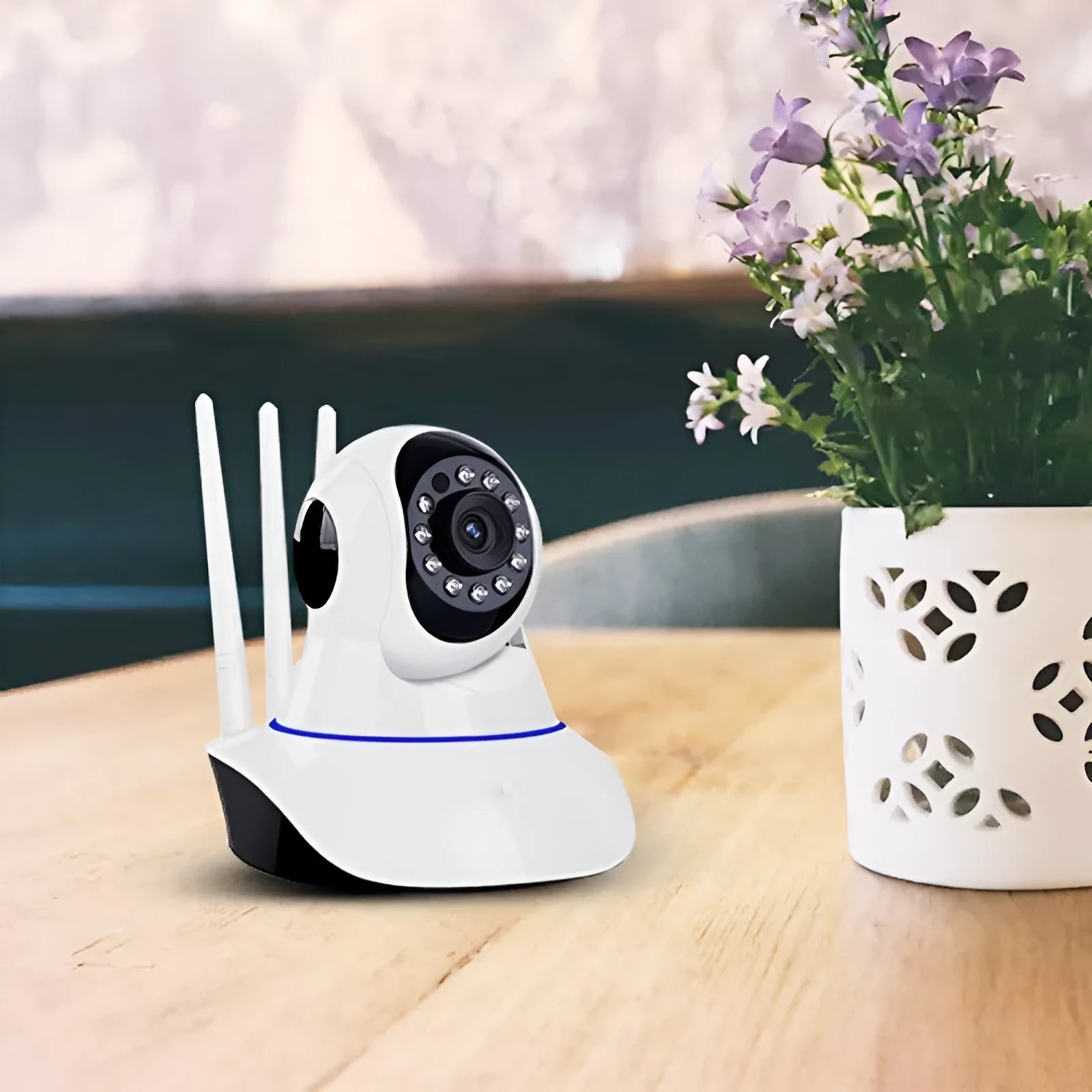 White dome-shaped wireless HD night vision surveillance camera for indoor and outdoor use.