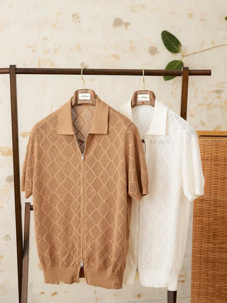 Light brown cotton short-sleeve cardigan with zipper and lapel collar laid flat.