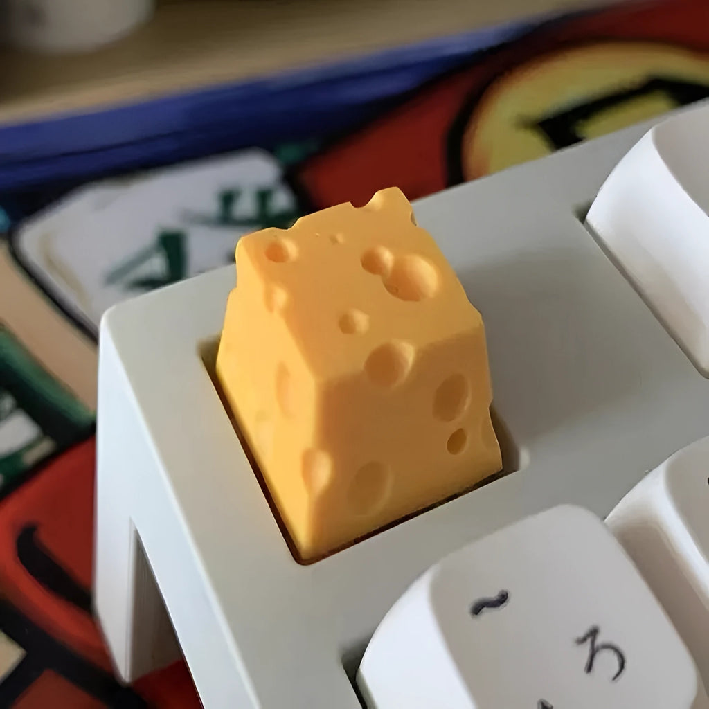 Yellow solid resin custom mechanical keyboard keycap with detailed cheese design