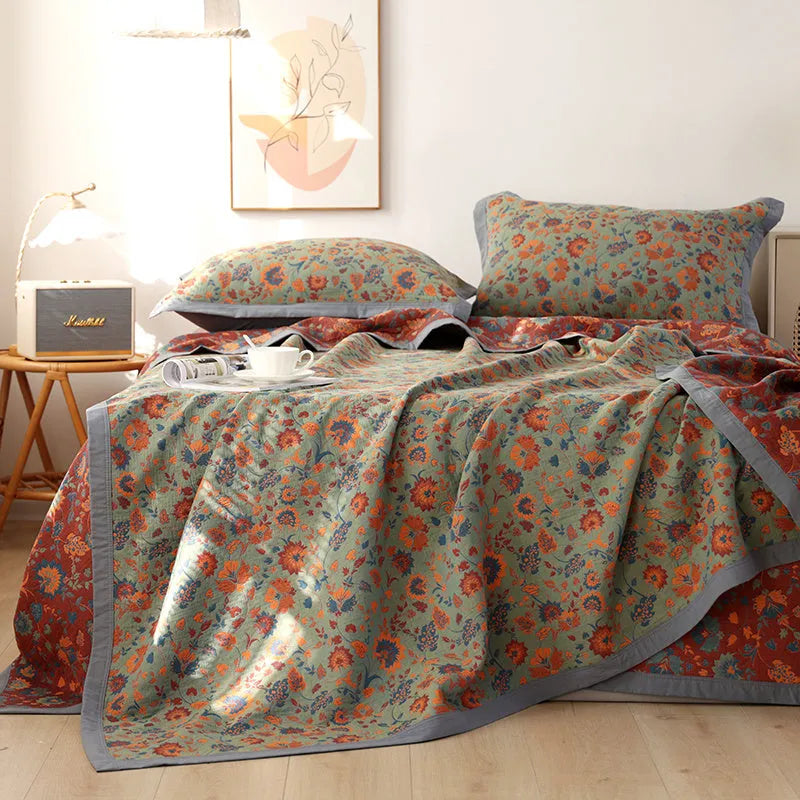 Cotton gauze three-piece bedding set with floral pattern including blanket and two pillowcases