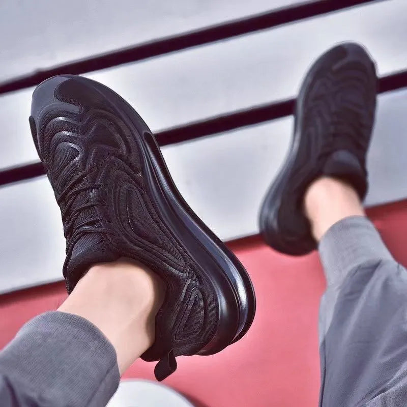 Men's black casual running shoes with lace-up front and round toe design