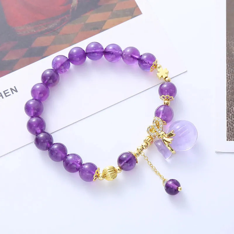 Purple amethyst bracelet with money bag pendant and adjustable cord