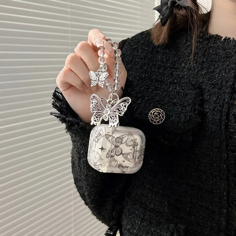 Butterfly TPU protective cover for AirPods with beaded pendant and embossed cartoon design