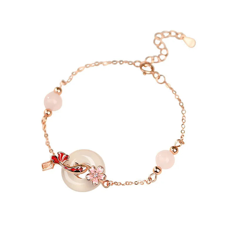 S925 sterling silver bracelet with white chalcedony crystal charm and koi fish design.