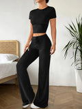 Black high waist trousers and short sleeve T-shirt suit set on hanger