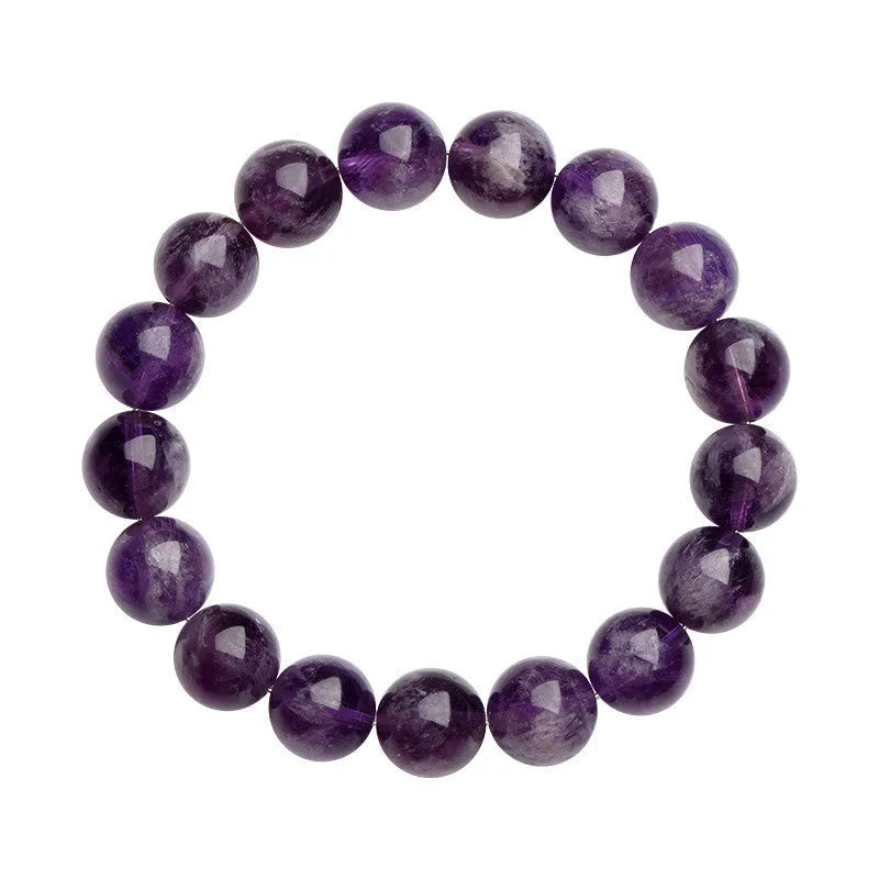 Natural purple feather amethyst crystal bracelet with geometric Ruyi design and scattered beads.