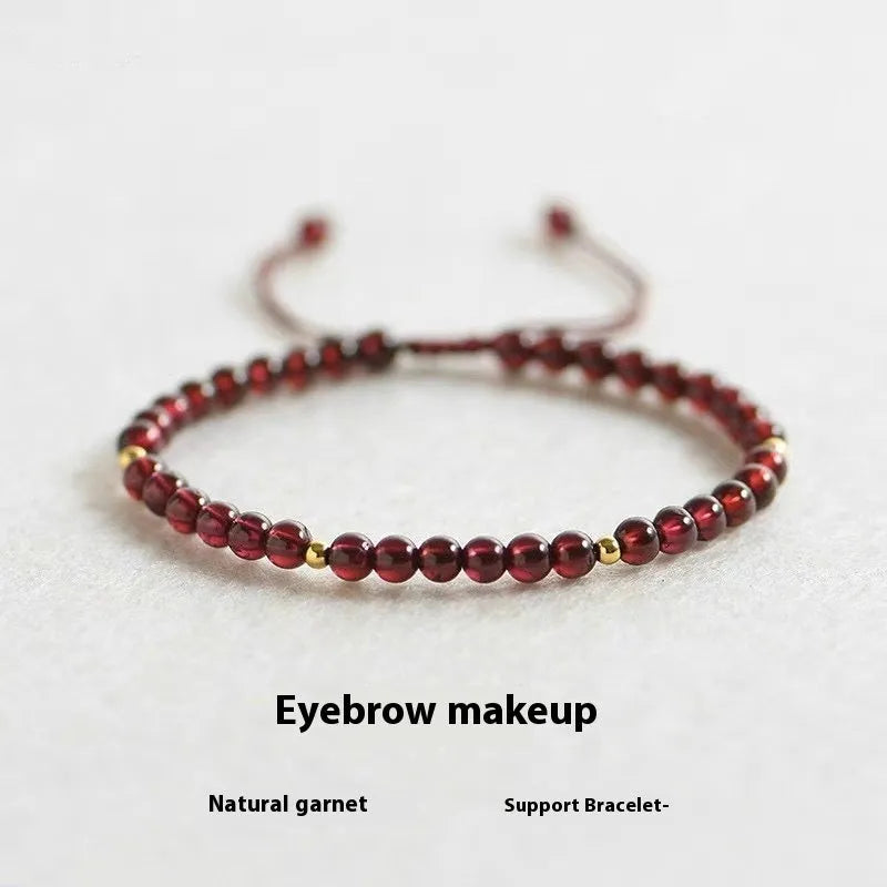 Hand-woven garnet red bracelet with flexible wire rope construction and Chinese national tide design