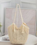 Handmade cotton thread woven hollow shoulder bag with tassel in creamy-white, vertical square shape, open pocket
