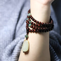 Rosewood bead bracelet with carved Hotian Jade pendant in national style design