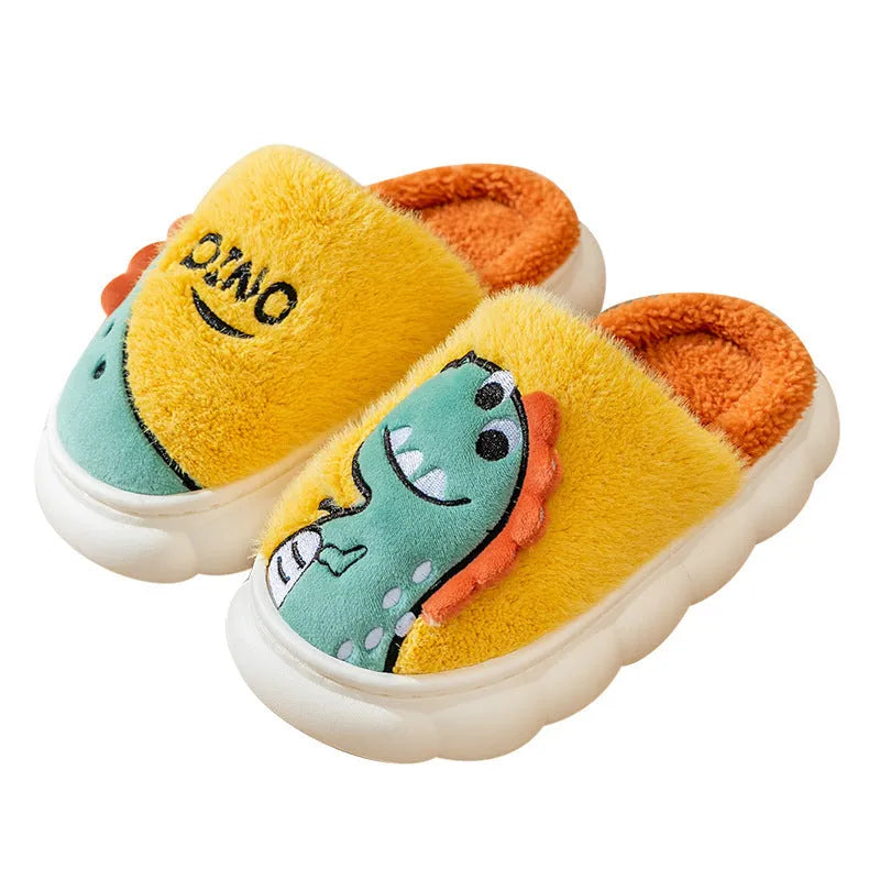 A pair of grey dinosaur print cotton slippers with plush lining, shown from above.