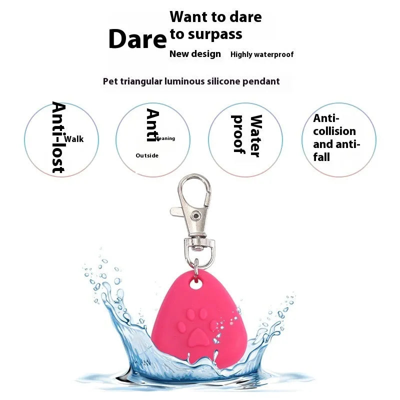 Silicone triangle-shaped pet pendant ornament in assorted colours for light-up collars.