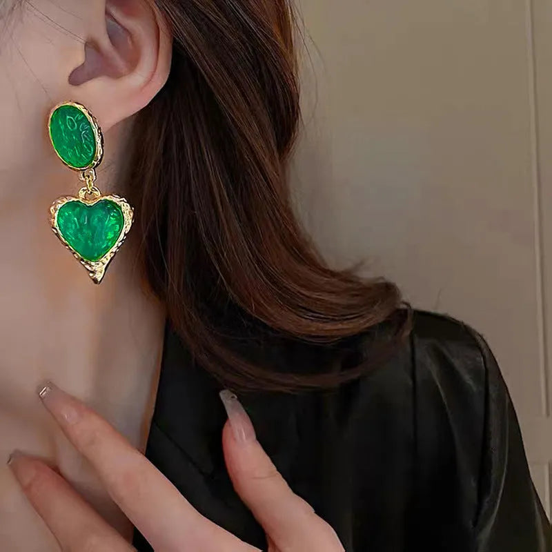 Oval love heart stud earrings with silver needle pleated design in four colour options