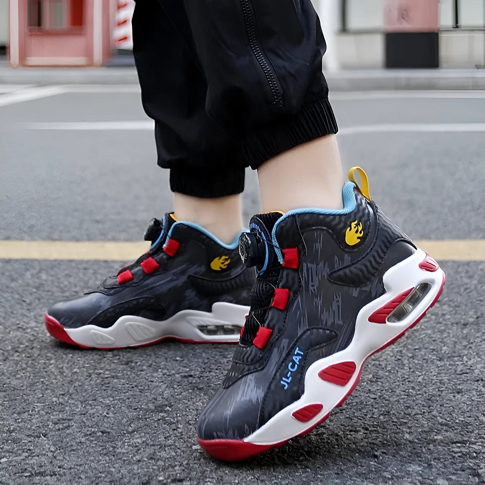 Children's rotating button basketball shoes in multiple colours with synthetic leather upper and PU sole.