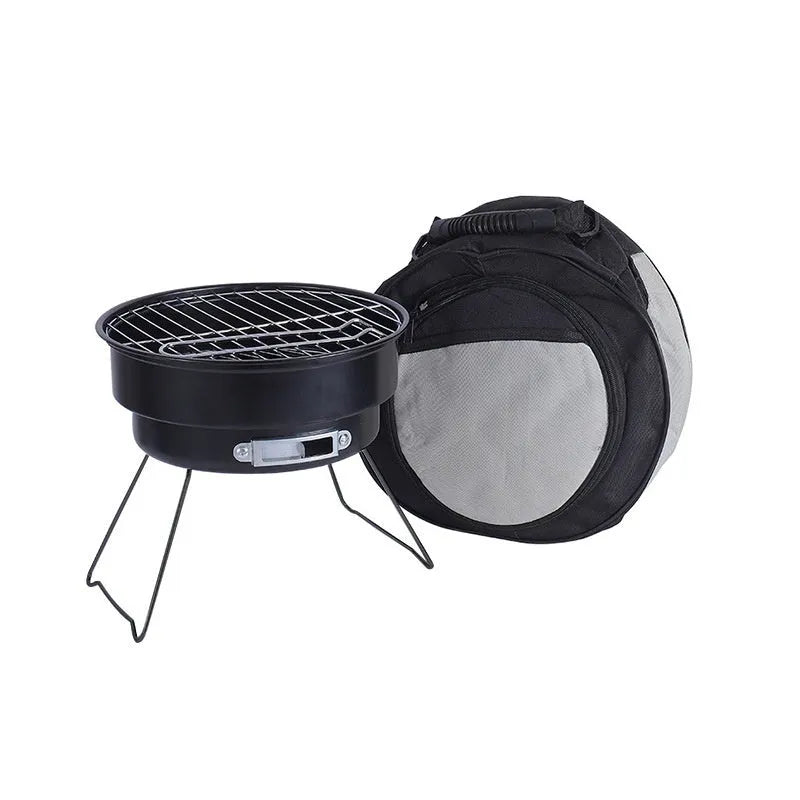 Compact metal folding round ice stove grill with legs, mesh, and carry bag for outdoor cooking.