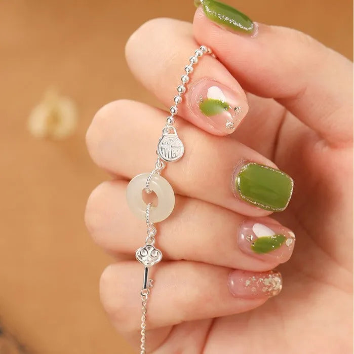 Hetian jade and 925 silver women's bracelet with geometric Chinese design and blessing card motif