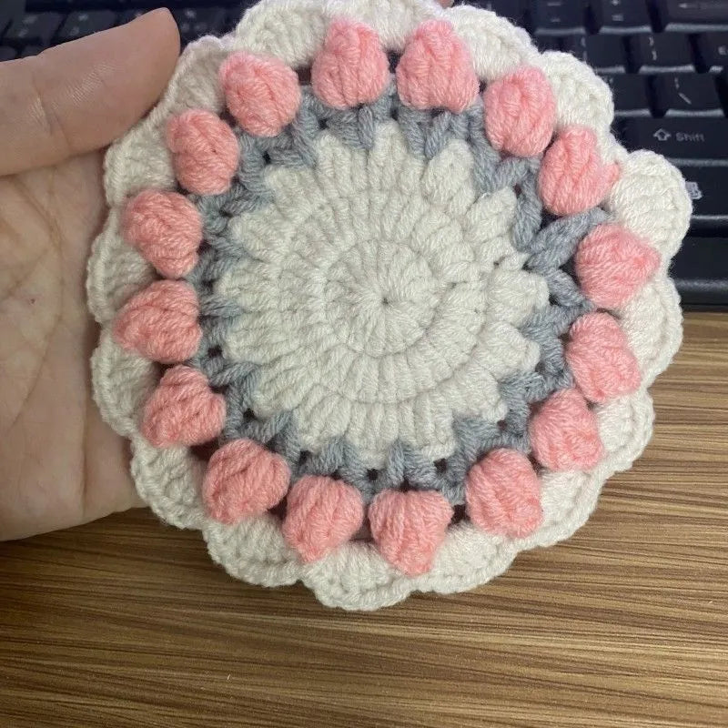 Handmade crochet woven flower coaster in cotton and linen yarn with floral design