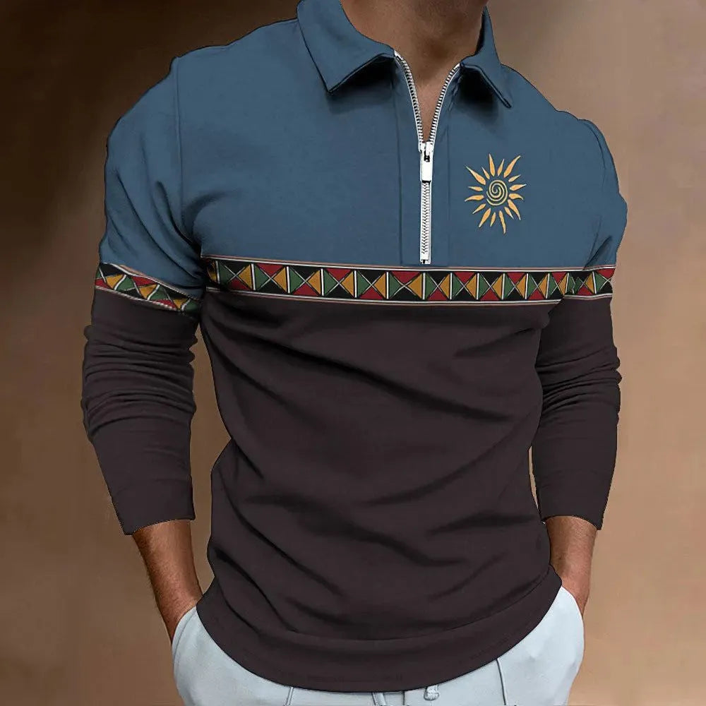 Man wearing a loose-fit, long-sleeve t-shirt with retro striped colour printing and a decorative zip detail.