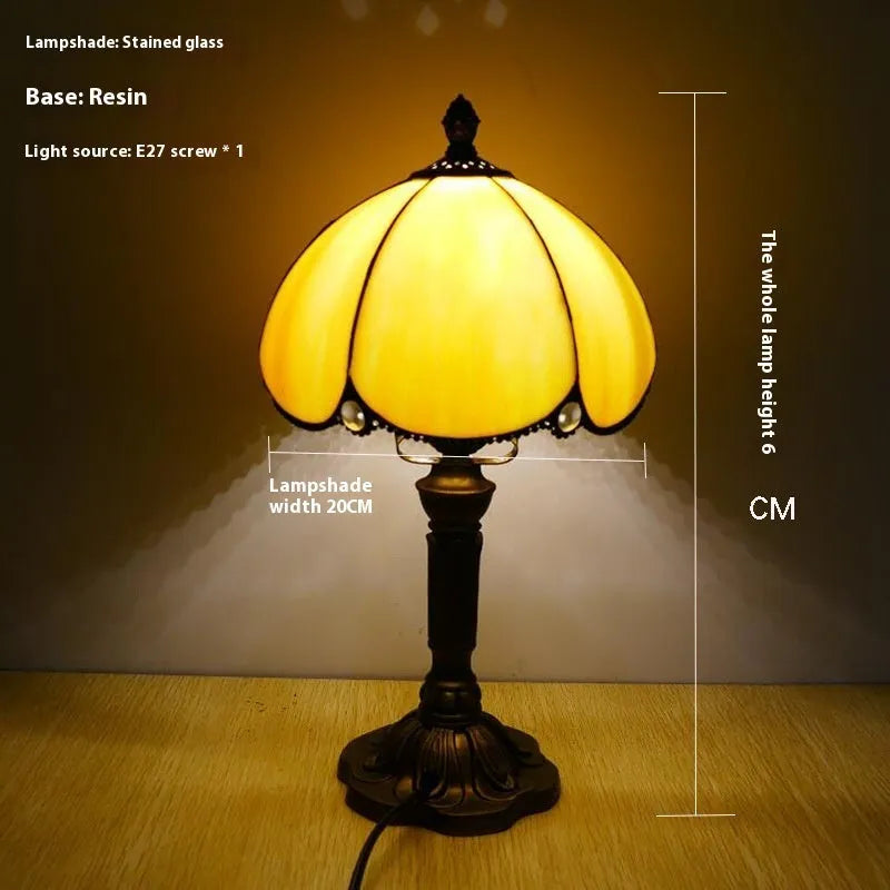 Beige fabric bedside lamp with simple modern design measuring 20cm wide