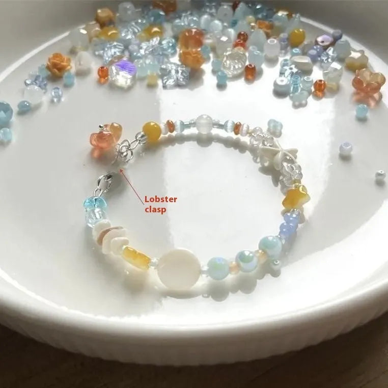 Orange sea summer bracelet with diamond shape design and round decorative elements
