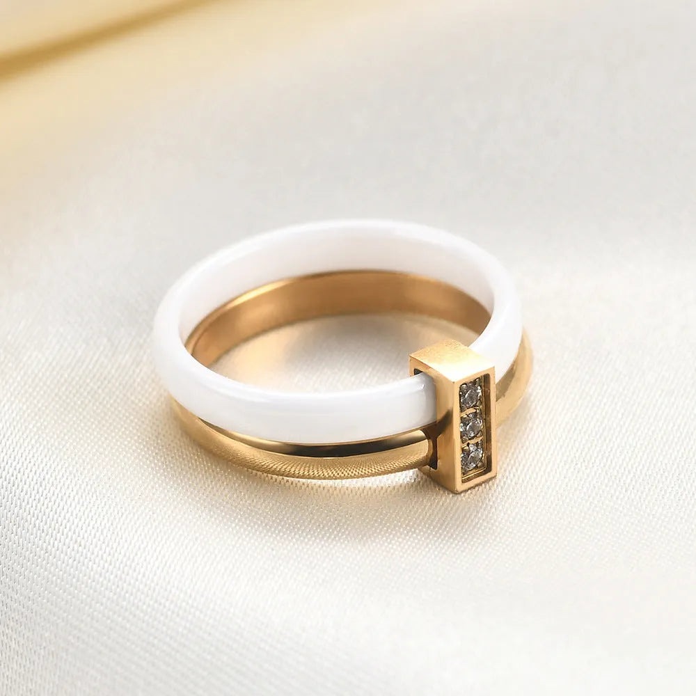 Geometric ceramic women's ring with a round 6mm zirconia stone in steel black colour.