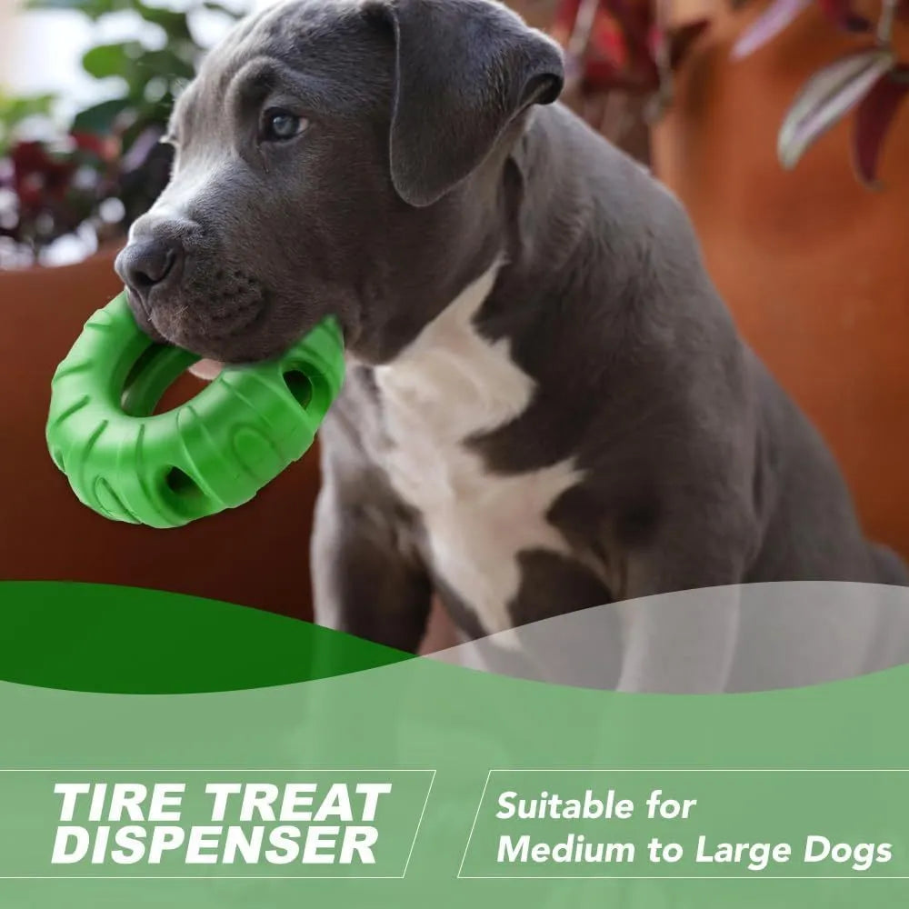 Blue natural rubber tyre-shaped dog chew toy with oval openings for treat dispensing