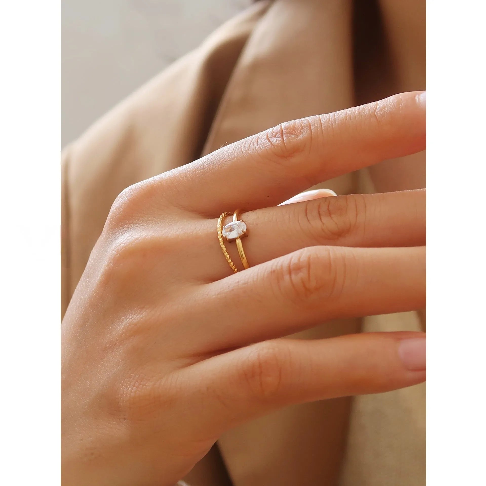 Golden electroplated stainless steel ring showing love heart and oval shapes in sizes no.5 to no.8